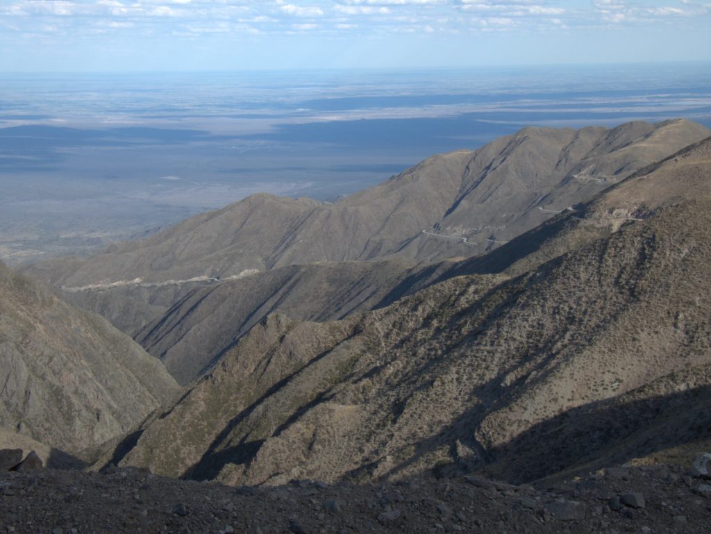 Looking toward Mendoza from Reserva Villavicencio, Argentina. You can see our road winding down the mountain in the distance.