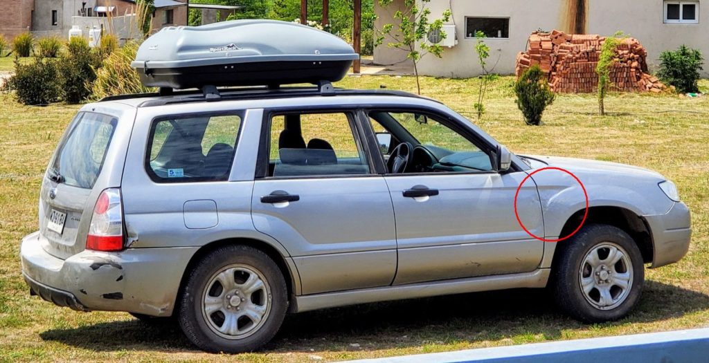 Subaru after repair (red circle)