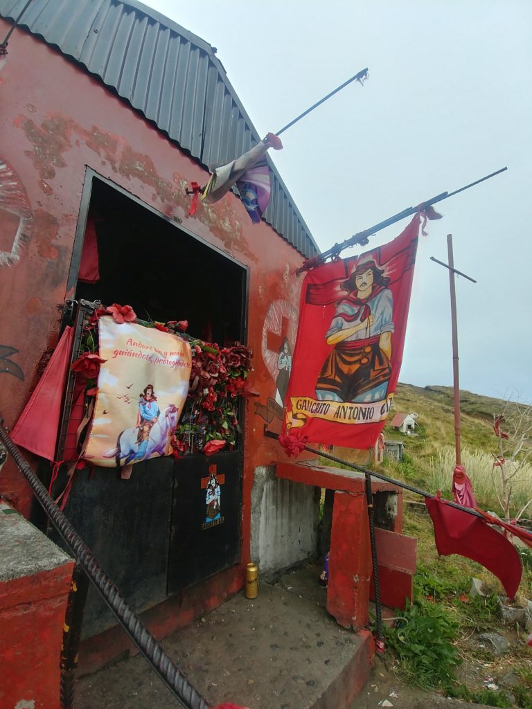 Elaborate roadside Gauchito Gil shrine, Cabo Domingo, Argentina